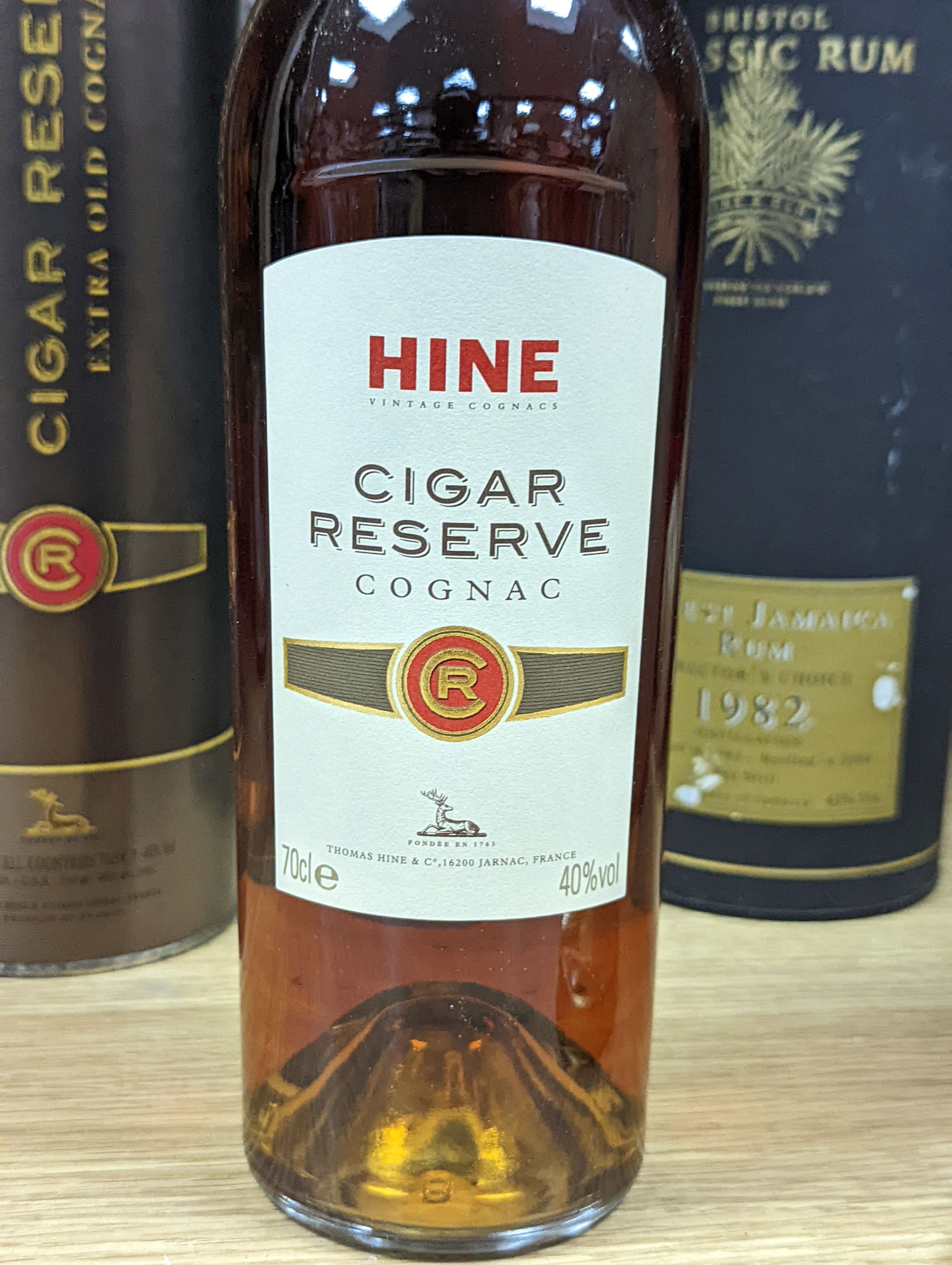 A boxed magnum of Hine Antique XO Cognac Grand Champagne Premier Cru, a boxed Hine Cigar Reserve Extra Old Cognac and one boxed Bristol Classic Rum Finest Jamaican Rum Directoe's Choice 1982.